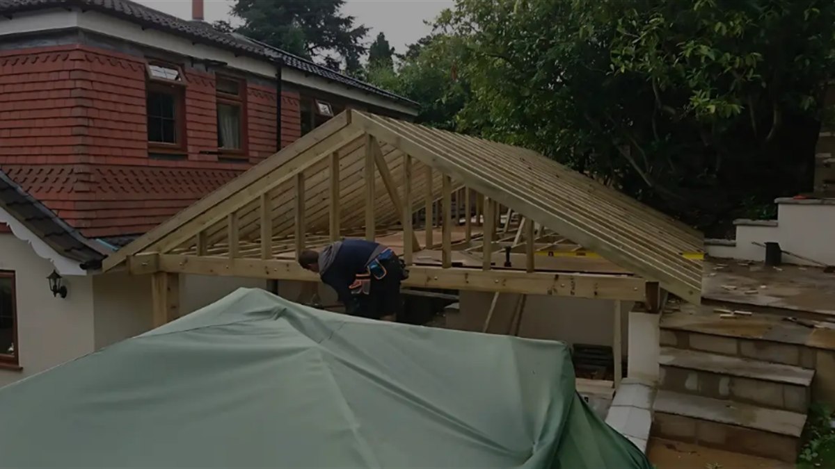 New roof structure being framed over the altered building, tying the loft build into the scheme designed at stage one